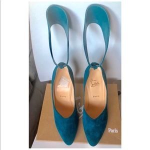 Christian Louboutin suede pumps with ankle strap.